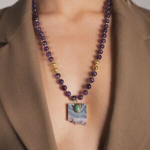 Elegant Amethyst stone and Gold Beaded Necklace with a green stone.